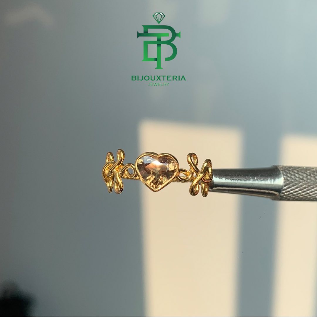Elegant Slender Twisted Rope Band Ring Featuring Heart Brilliant Cut Amber Stone