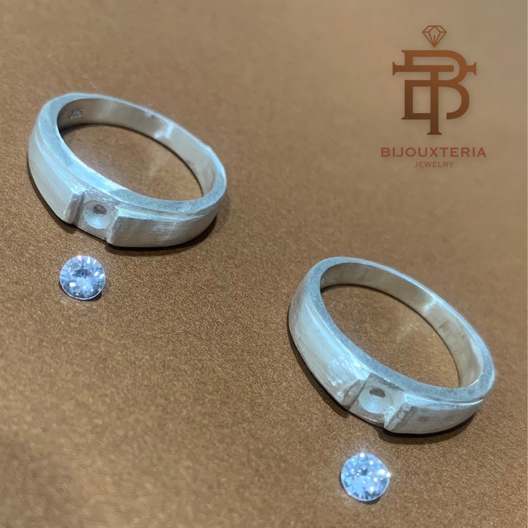 Tension-Set Diamond Couple Rings