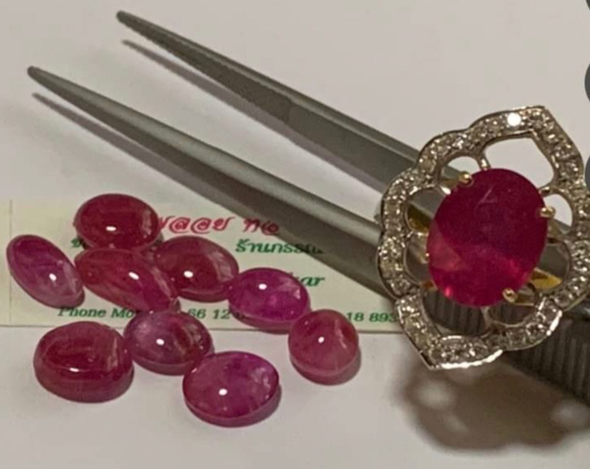 Oval Natural Ruby Openwork Diamond Halo Ring